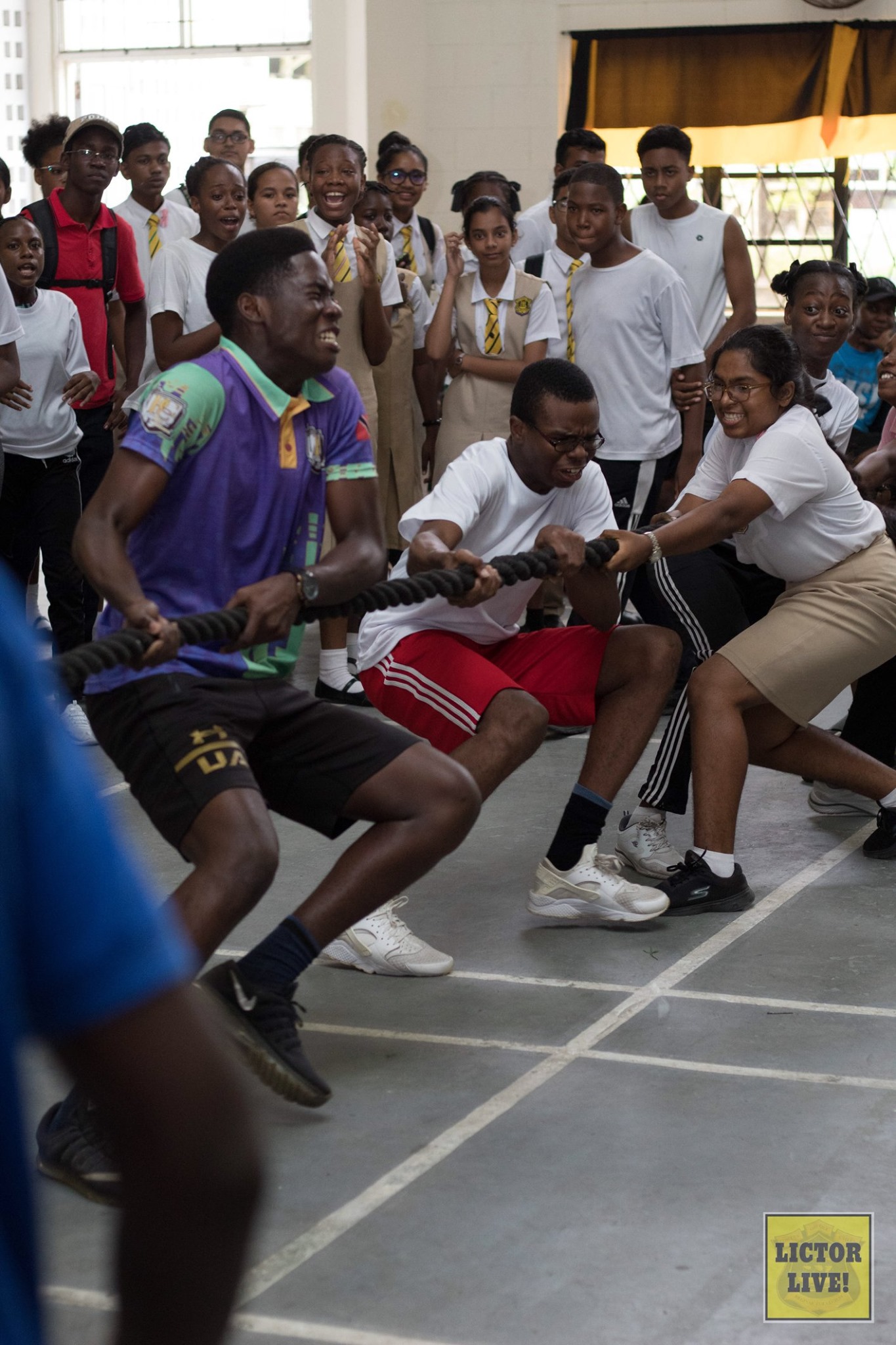 <strong></strong><br>“Pretty in Pink” may not be said of the Moulder or “G” house tug-of-war team seen giving their utmost at the final event of the 2019 Fitness Competition. The Fitness Competition is an annual event hosted by Fifth Form Physical Education students as an exam component.<br>Photo: <em>Lictor Live!</em>