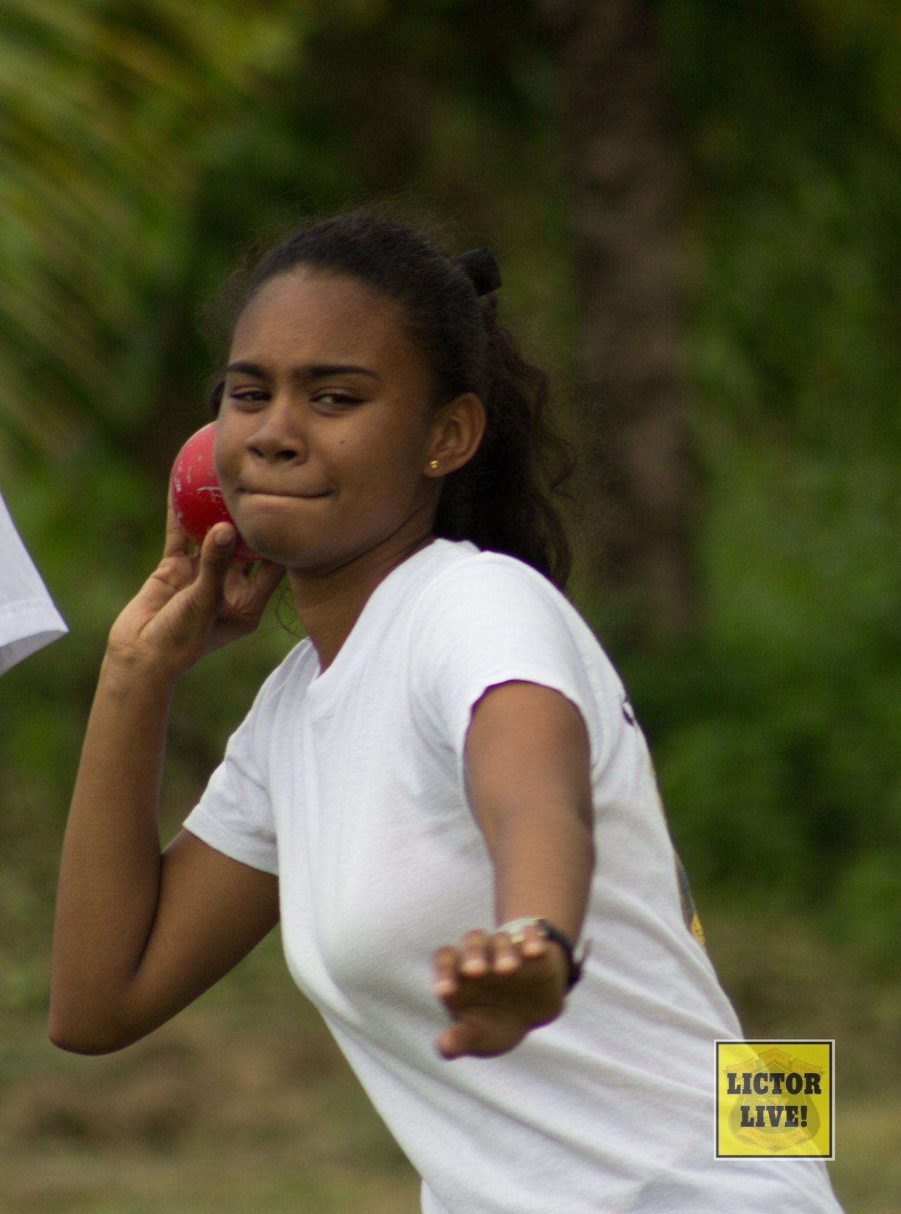 <strong></strong><br>At the 2018 Field Events, a Lower Sixth Form Student shows great concentration as she prepares to release the shotput. Field events at this stage are known as qualifiers since each athlete has three chances to pass the appropriate distance in order to qualify for participation in the finals.<br>Photo: <em>Lictor Live!</em>